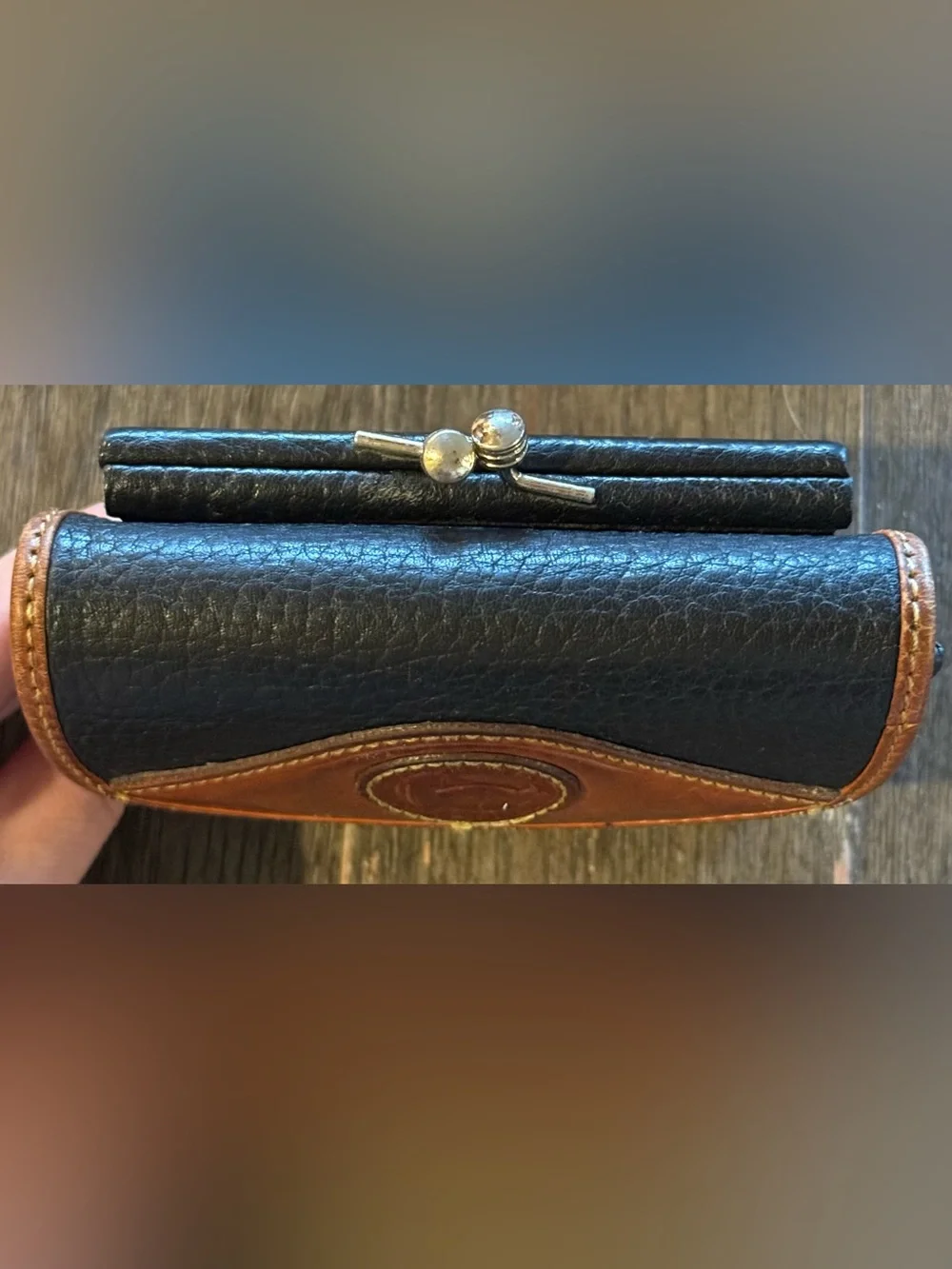 Dooney & Bourke Black Leather Wallet with Brown Trim